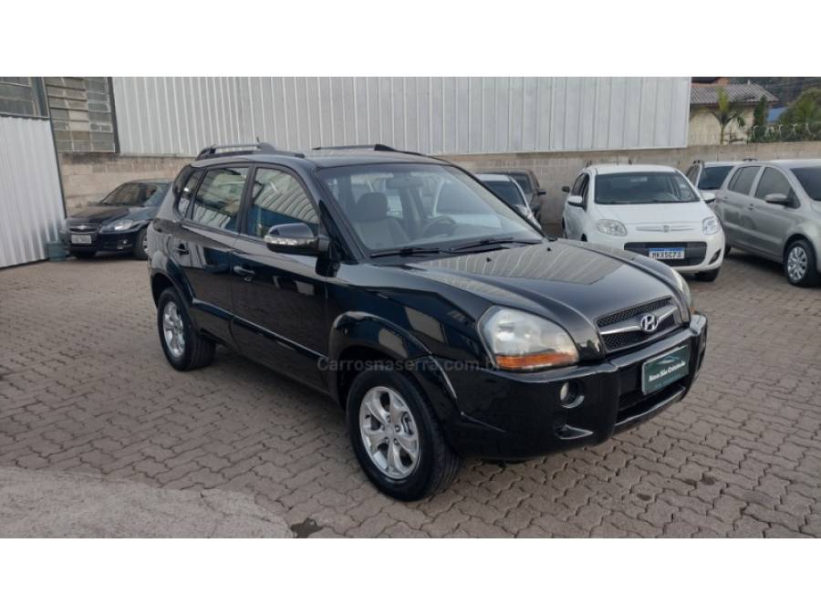 HYUNDAI - TUCSON - 2010/2011 - Preta - R$ 43.500,00