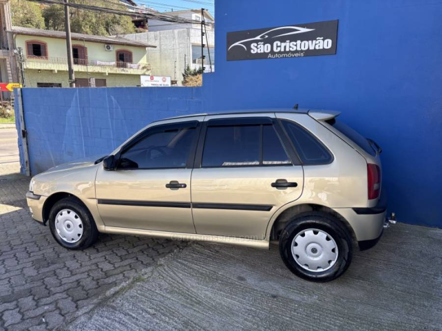 VOLKSWAGEN - GOL - 2002/2003 - Bege - R$ 24.500,00